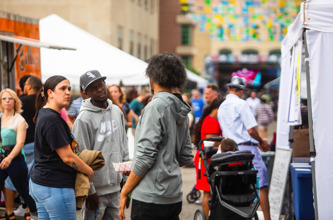 Hundreds of people gather in downtown Flint's Buckham Alley for Alley Fest on Saturday, July 8, 2023. (Katy Kildee | Flintside)