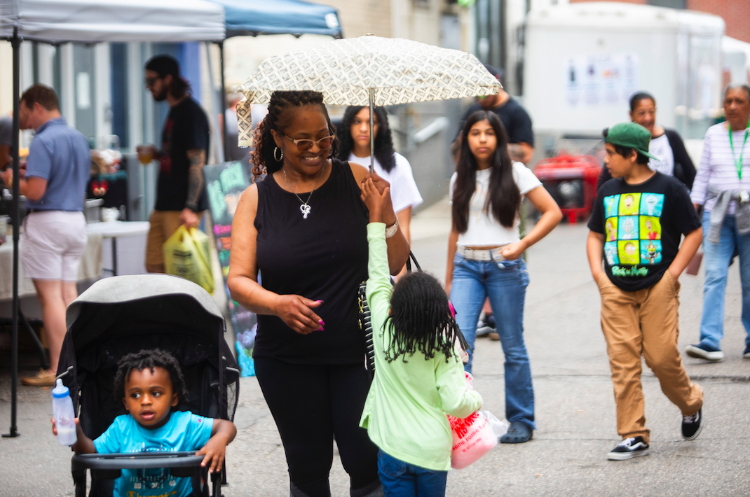 Hundreds of people gather in downtown Flint's Buckham Alley for Alley Fest on Saturday, July 8, 2023. (Katy Kildee | Flintside)
