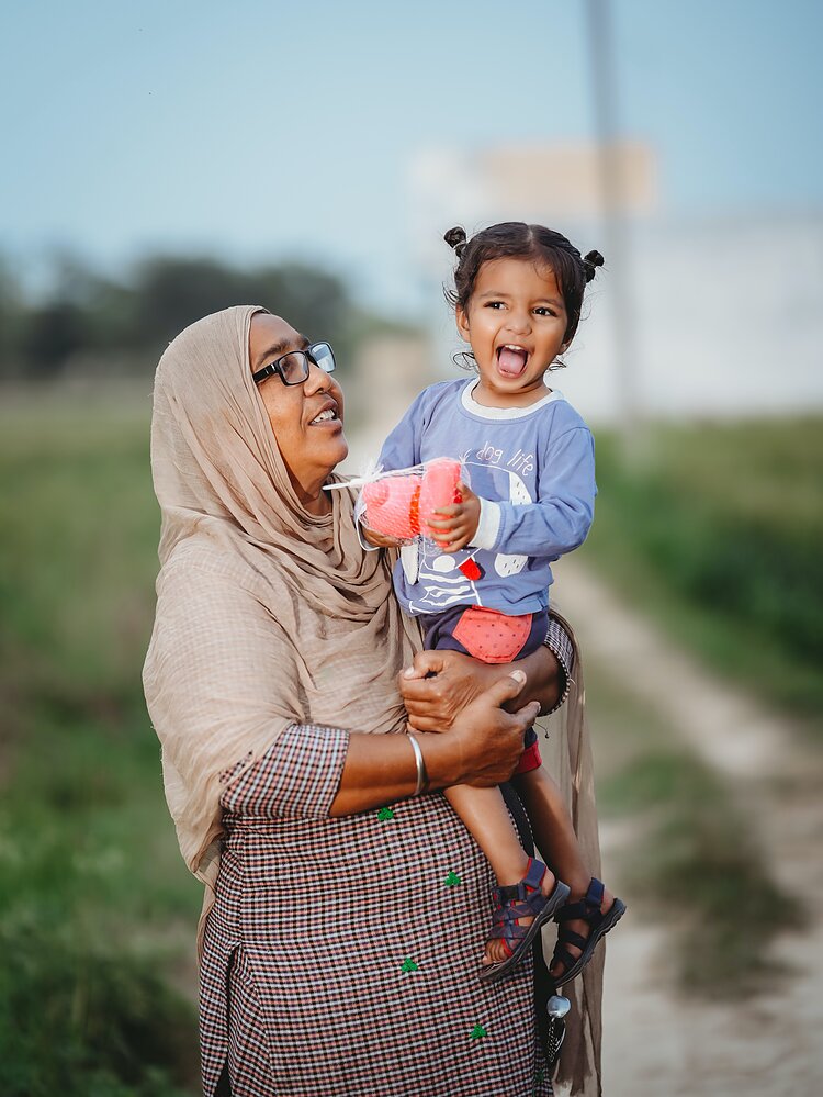 A mother and her daughter.