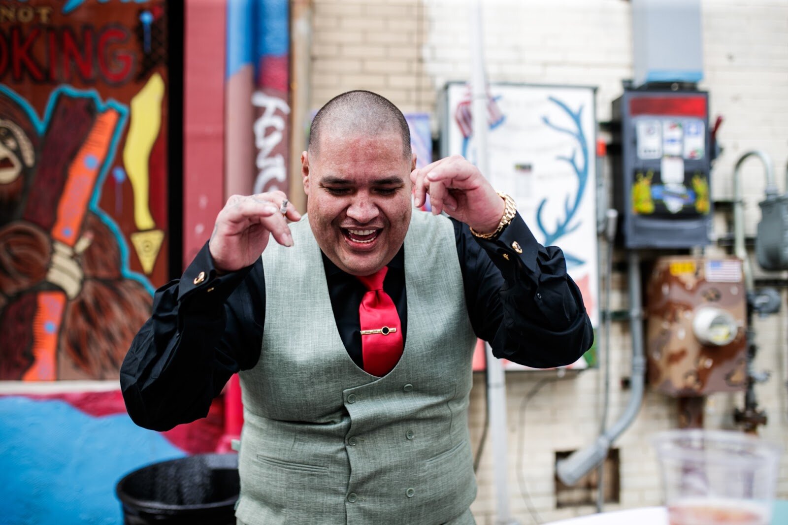 Boris Fernando Porras Rios dances during the Latinx Technology & Community Center’s Cinco de Mayo celebration on Friday, May 5, 2023, in Buckham Alley in downtown Flint. (Jenifer Veloso | Flintside)

