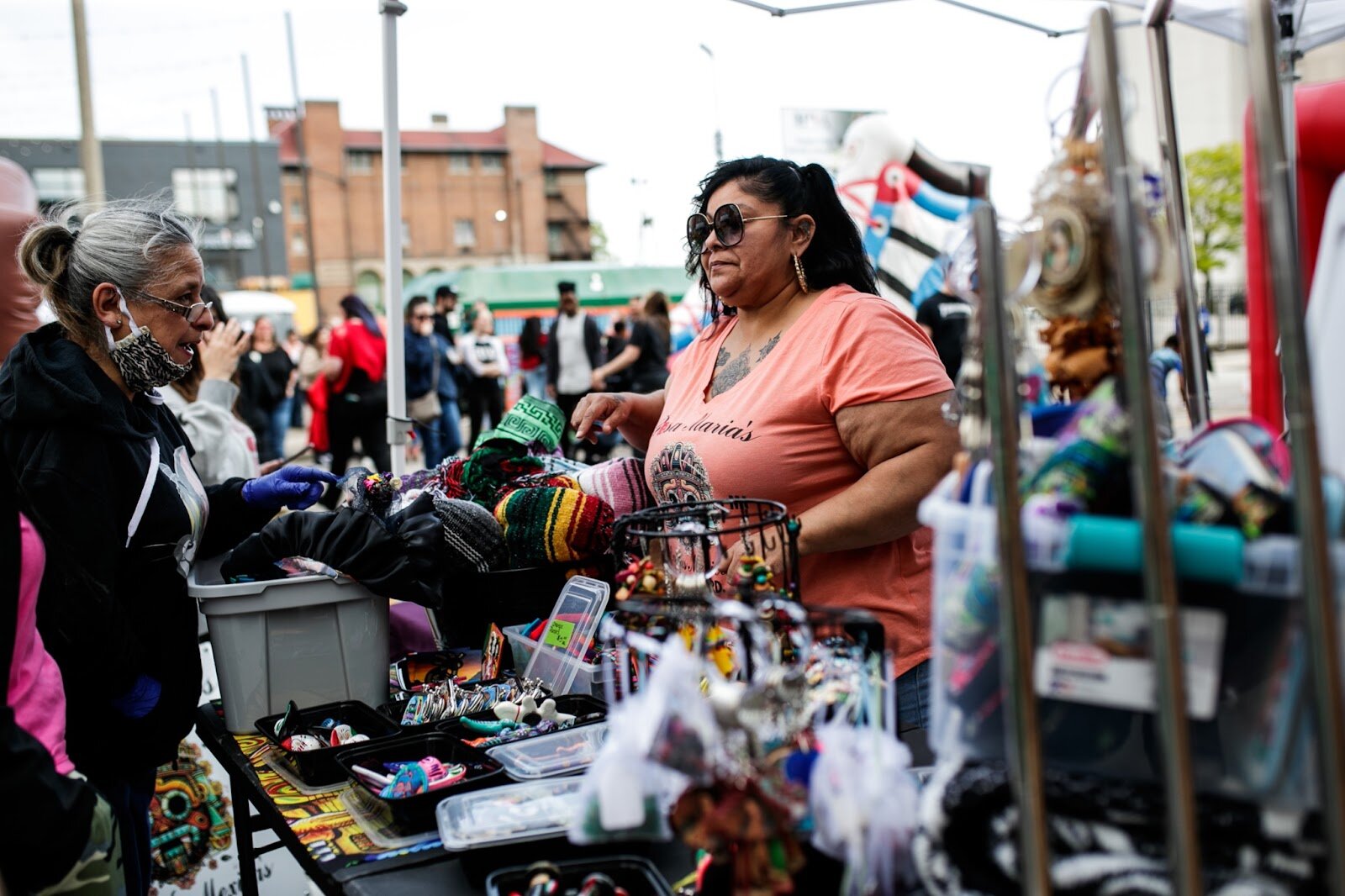 A vendor sells authentic Mexican jewelry, clothes, and more during the Latinx Technology & Community Center’s Cinco de Mayo celebration on Friday, May 5, 2023, in Buckham Alley in downtown Flint. (Jenifer Veloso | Flintside)
