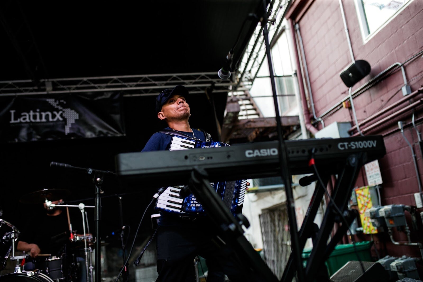 A live band performs during the Latinx Technology & Community Center’s Cinco de Mayo celebration on Friday, May 5, 2023, in Buckham Alley in downtown Flint. (Jenifer Veloso | Flintside)
