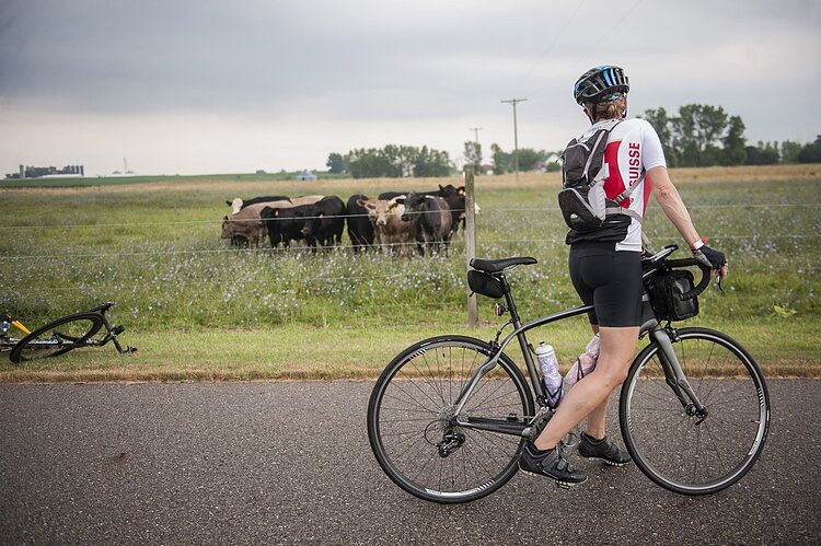 Cyclist riding on the Fred Meijer Kenowa Trail near Jamestown.
