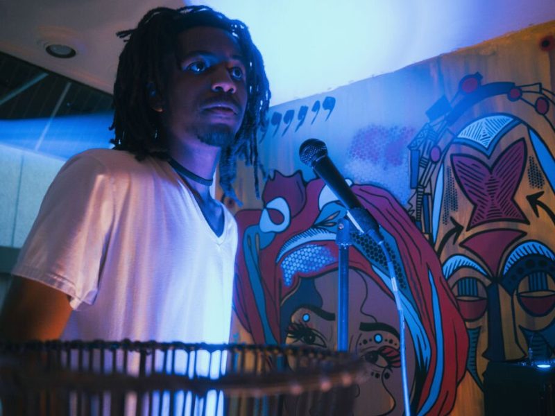 Local music artist Wutae The World during Open Mic Night at Comma Bookstore & Social Hub on Friday, April 7, 2023.