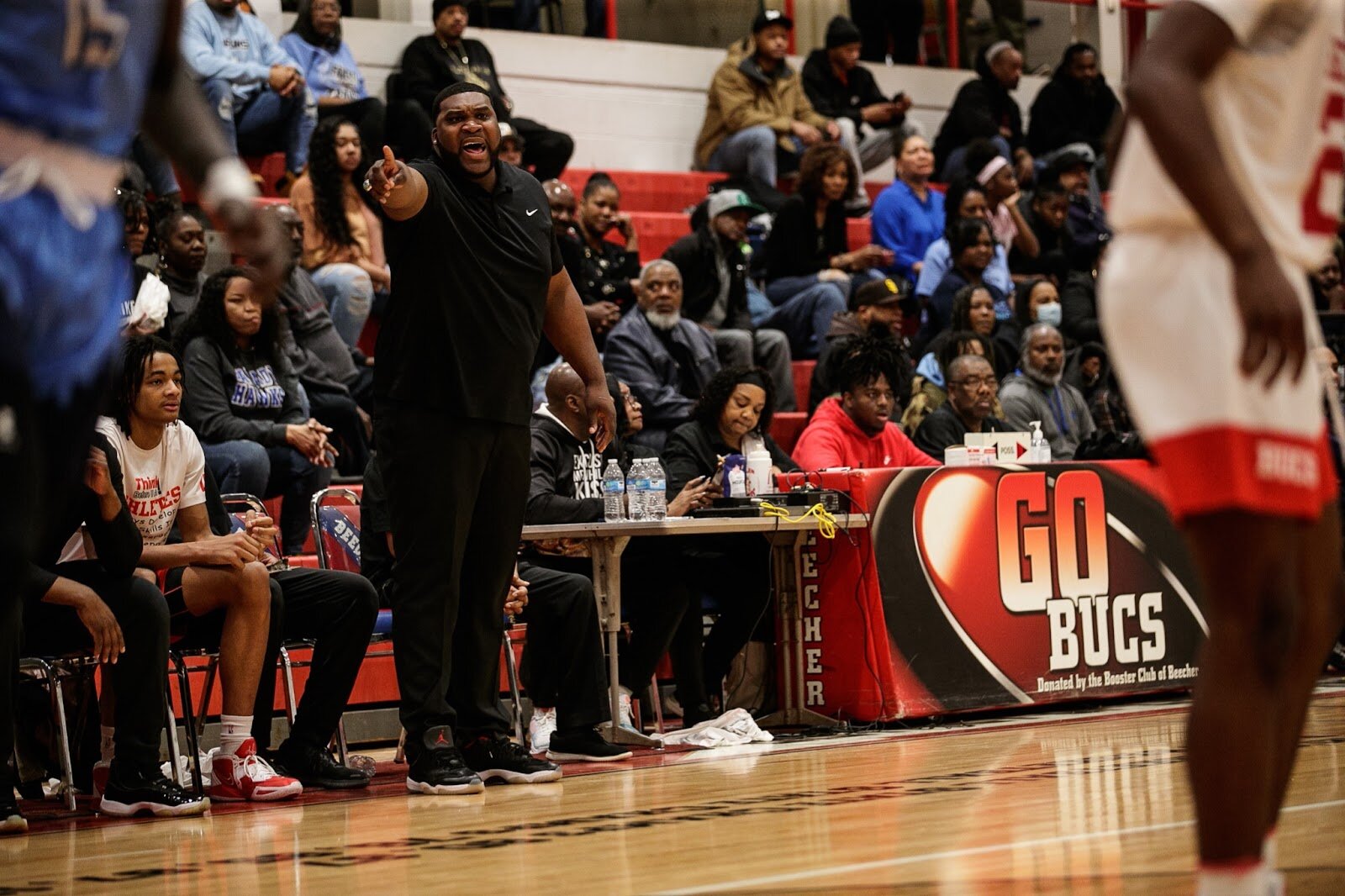 Beecher Head Coach Marquise Gray calls out to his team during the boys' varsity basketball game on Saturday, Feb. 18, 2023, at the Moses Lacey Fieldhouse in Mount Morris. Beecher defeated Hamady 48-43 (Jenifer Veloso | Flintside)
