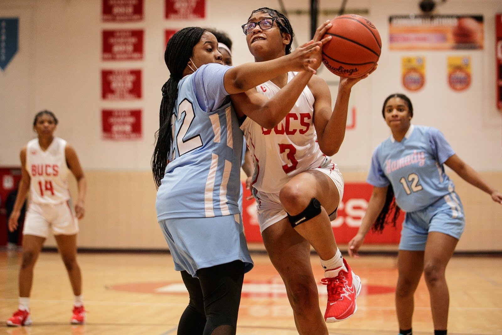 Beecher senior Amiyah Brown fights through the defense during the girls' varsity basketball game on Saturday, Feb. 18, 2023, at the Moses Lacey Fieldhouse in Mount Morris. Hamady defeated Beecher girls 49-45 (Jenifer Veloso | Flintside)
