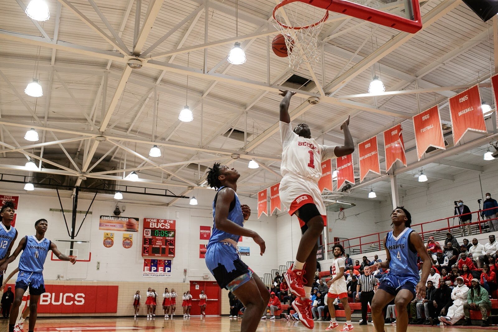 Beecher senior Kevin Tiggs Jr shoots a basket during the boys' varsity basketball game on Saturday, Feb. 18, 2023, at the Moses Lacey Fieldhouse in Mount Morris. Beecher defeated Hamady 48-43 (Jenifer Veloso | Flintside)
