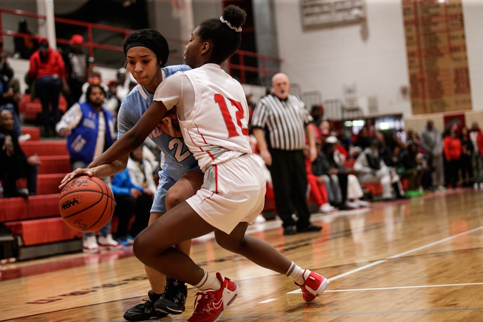Hamady player Mahriya Sharp drives to the basket during the girls' varsity basketball game on Saturday, Feb. 18, 2023, at the Moses Lacey Fieldhouse in Mount Morris. Hamady defeated Beecher girls 49-45. (Jenifer Veloso | Flintside)
