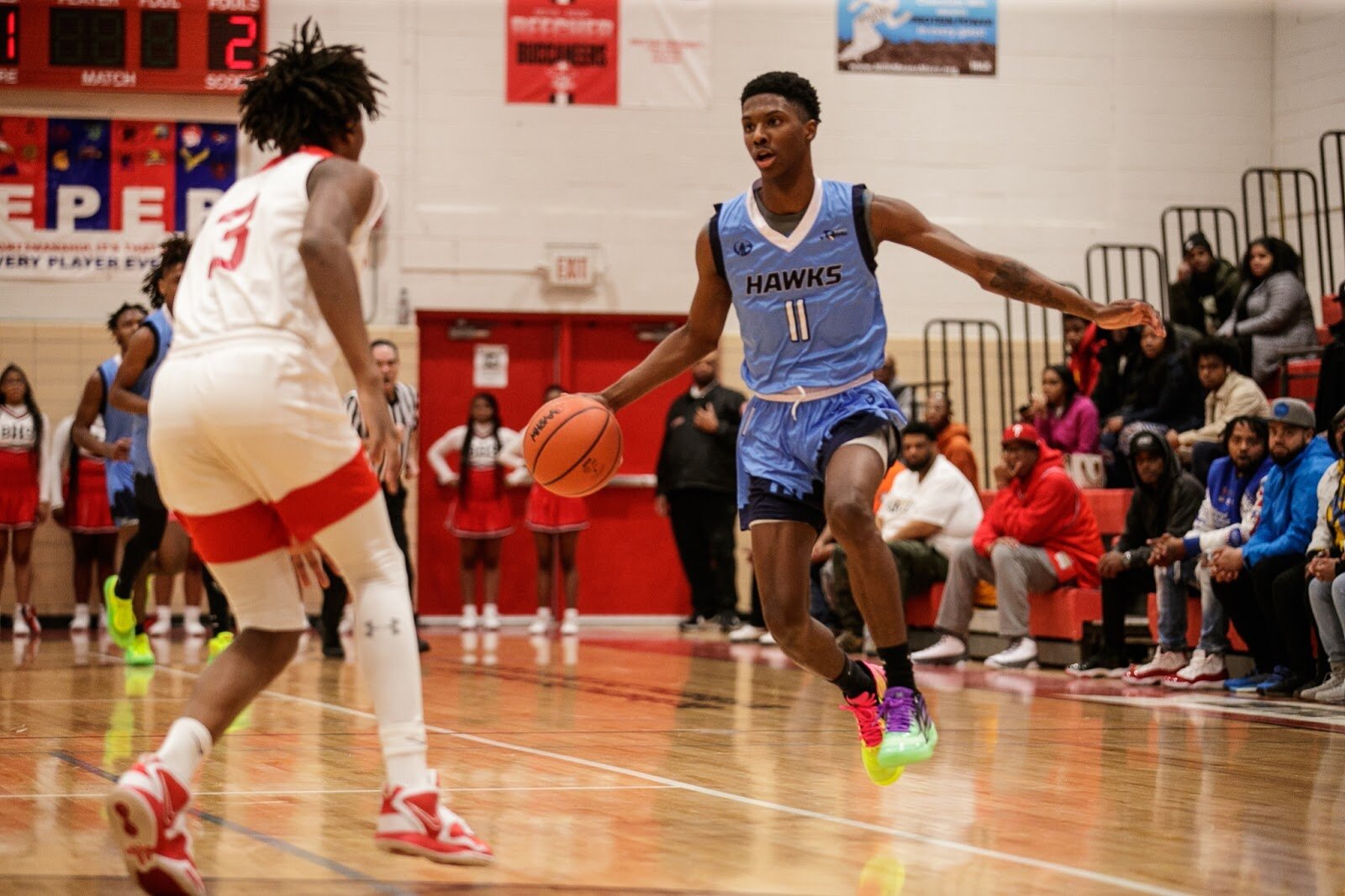 Hamady player Lamont Green -Torbert drives the ball during the boys' varsity basketball game on Saturday, Feb. 18, 2023, at the Moses Lacey Fieldhouse in Mount Morris. Beecher defeated Hamady 48-43. (Jenifer Veloso | Flintside)
