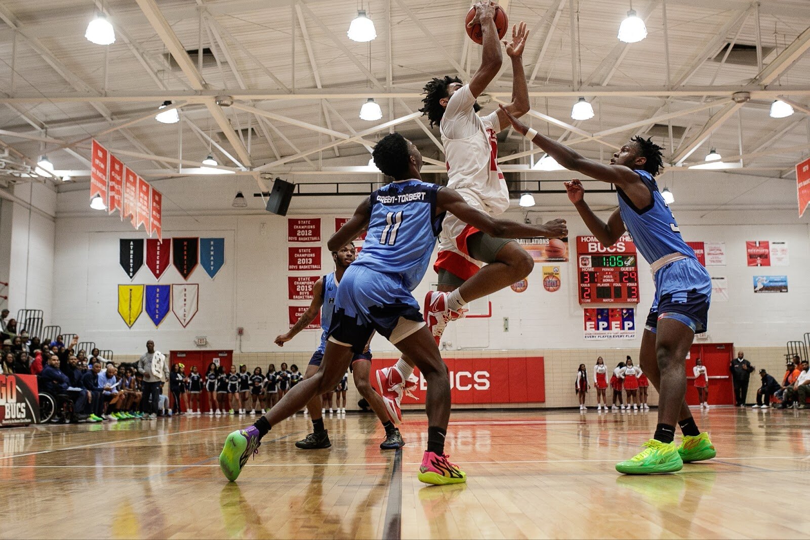 Beecher senior Robert Lee Jr shoots under pressure during the boys' varsity basketball game on Saturday, Feb. 18, 2023, at the Moses Lacey Fieldhouse in Mount Morris. Beecher defeated Hamady 48-43. (Jenifer Veloso | Flintside)
