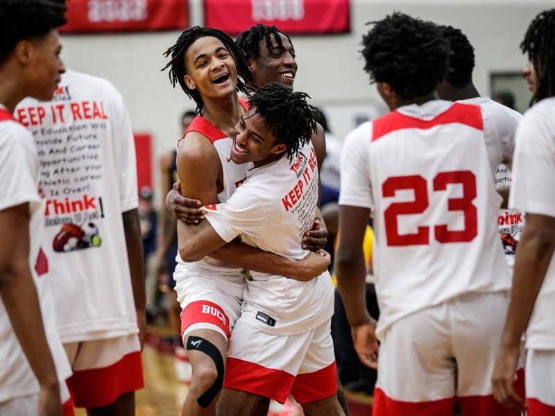 Beecher sophomore Wasir James celebrates a field goal with teammates during the Beecher vs Saginaw Arthur Hill game at Grand Blanc High School for The Carmody Classic on Saturday, Jan. 07, 2022. (Jenifer Veloso | Flintside)