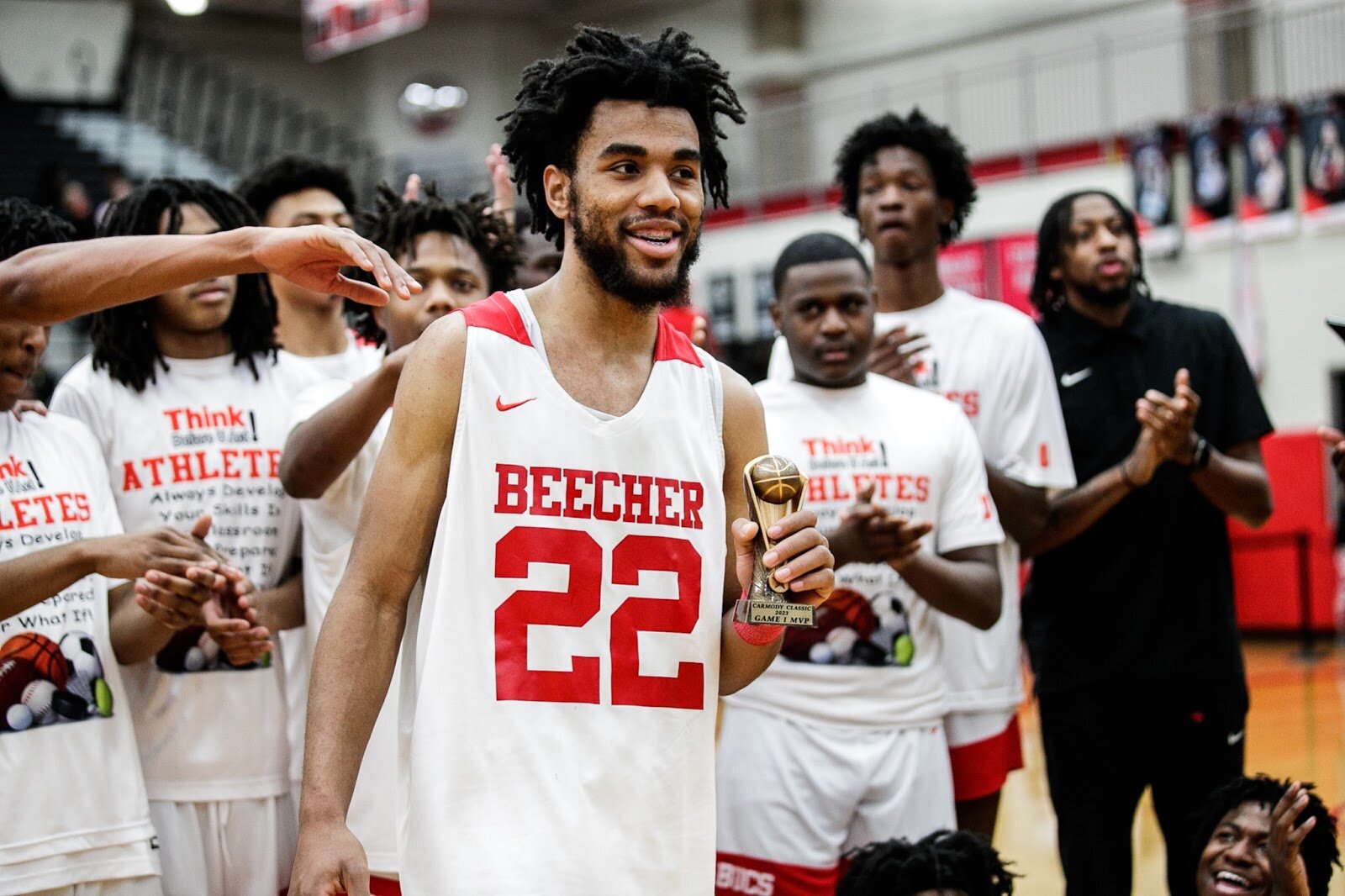 Beecher senior Robert Lee Jr. receives the MVP of the game award during the Beecher vs Saginaw Arthur Hill game at Grand Blanc High School for The Carmody Classic on Saturday, Jan. 07, 2022. Beecher defeated Arthur Hill 77-44 (Jenifer Veloso | Flintside)
