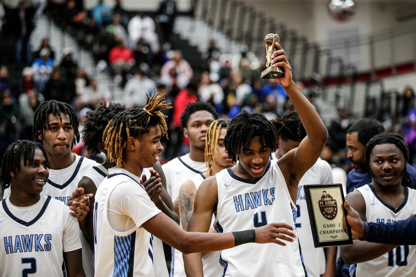 Hamady Jakobie Boone receives the MVP award at the end of the Hamady vs Hamtramck game at Grand Blanc High School for The Carmody Classic on Saturday, Jan. 07, 2022. Hamady defeated Hamtramck 70-55 (Jenifer Veloso | Flintside)
