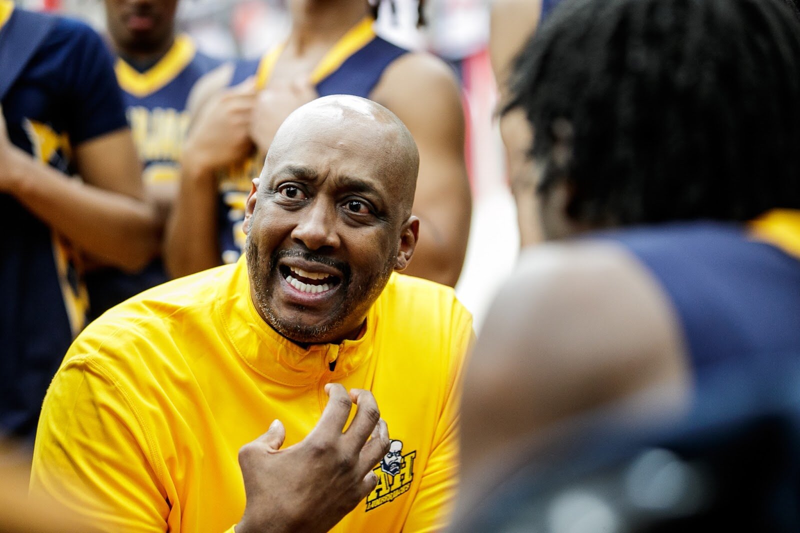 Arthur Hill Head Coat Anthony Davis talk to his players during a time-out at the Beecher vs Saginaw Arthur Hill game at Grand Blanc High School for The Carmody Classic on Saturday, Jan. 07, 2022. Beecher defeated Arthur Hill 77-44 (Jenifer Veloso | Flintside)
