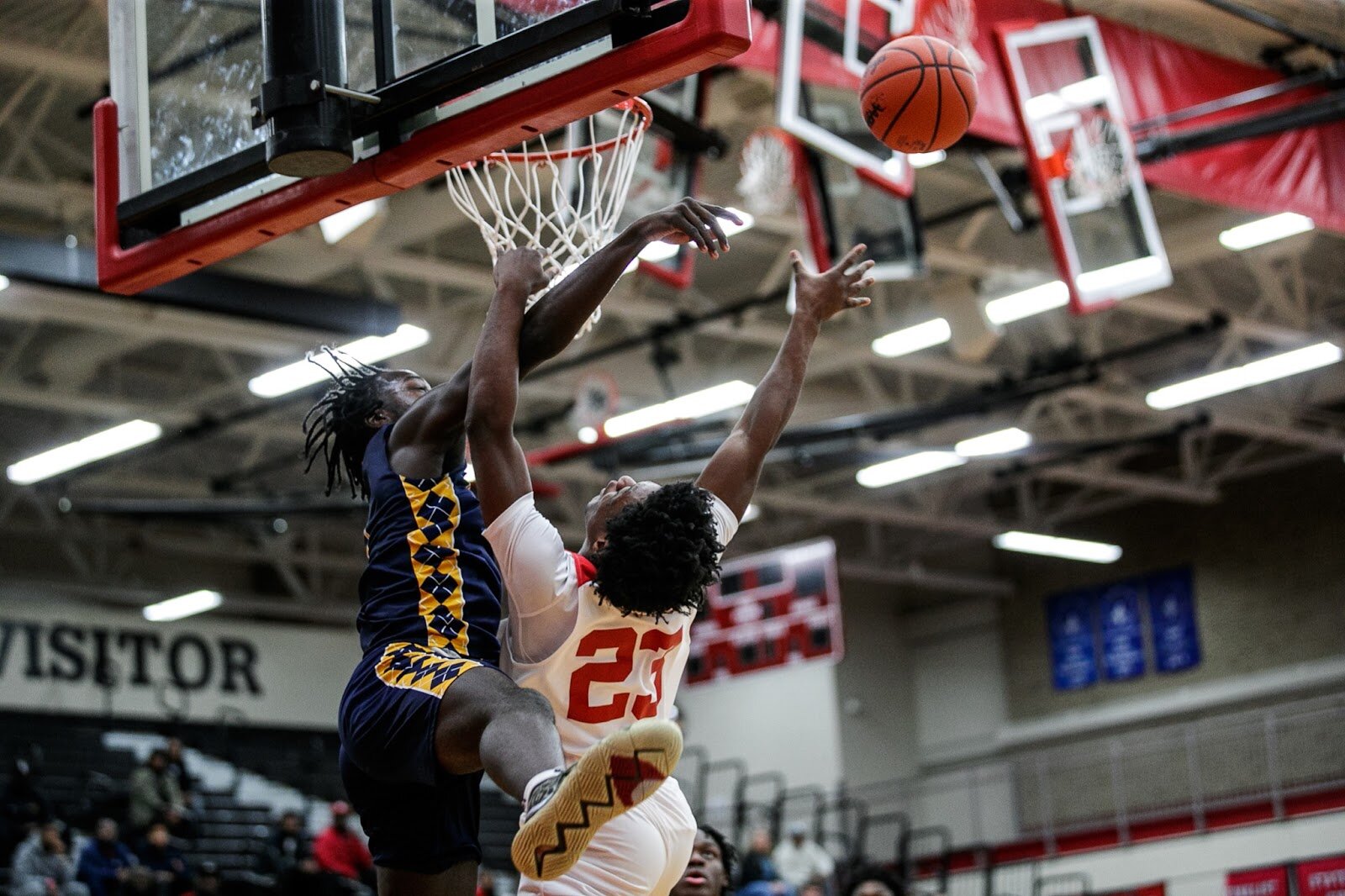 Beecher junior Jaylen Townsend is fouled during a field goal attempt at the Beecher vs Saginaw Arthur Hill game at Grand Blanc High School for The Carmody Classic on Saturday, Jan. 07, 2022. Beecher defeated Arthur Hill 77-44 (Jenifer Veloso | Flintside)
