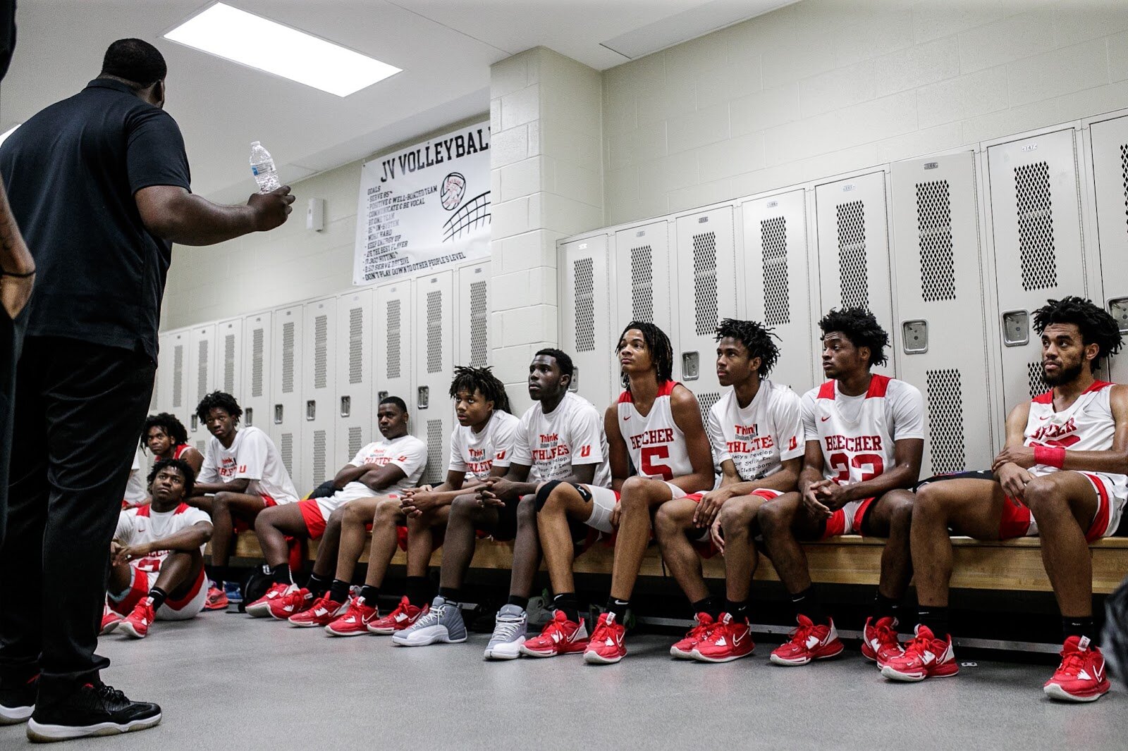 Head Coach Marquise’ Gray talks to his team at halftime during the Beecher vs Saginaw Arthur Hill game at Grand Blanc High School for The Carmody Classic on Saturday, Jan. 07, 2022. Beecher defeated Arthur Hill 77-44 (Jenifer Veloso | Flintside)
