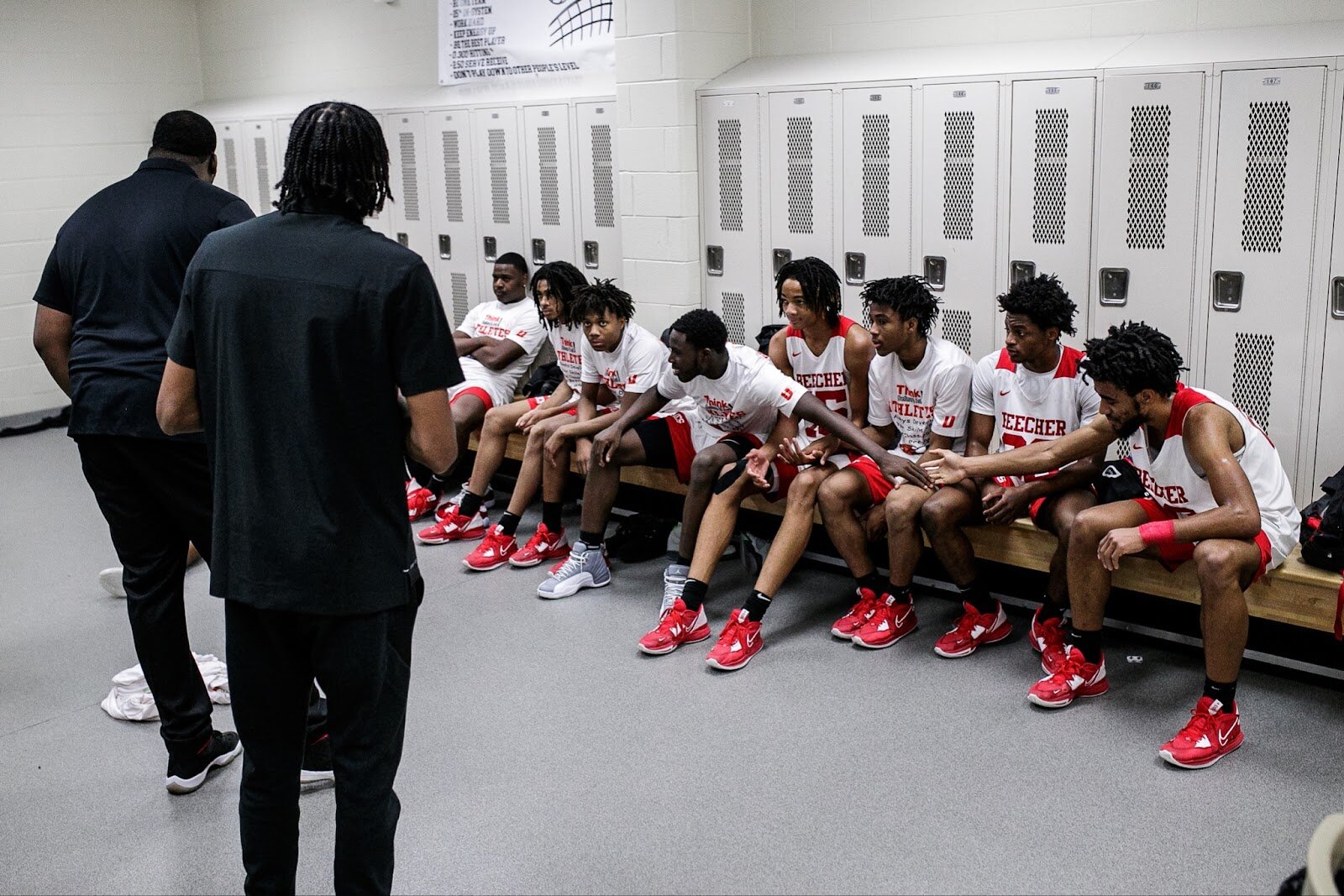 Head Coach Marquise’ Gray talks to his team at halftime during the Beecher vs Saginaw Arthur Hill game at Grand Blanc High School for The Carmody Classic on Saturday, Jan. 07, 2022. Beecher defeated Arthur Hill 77-44 (Jenifer Veloso | Flintside)
