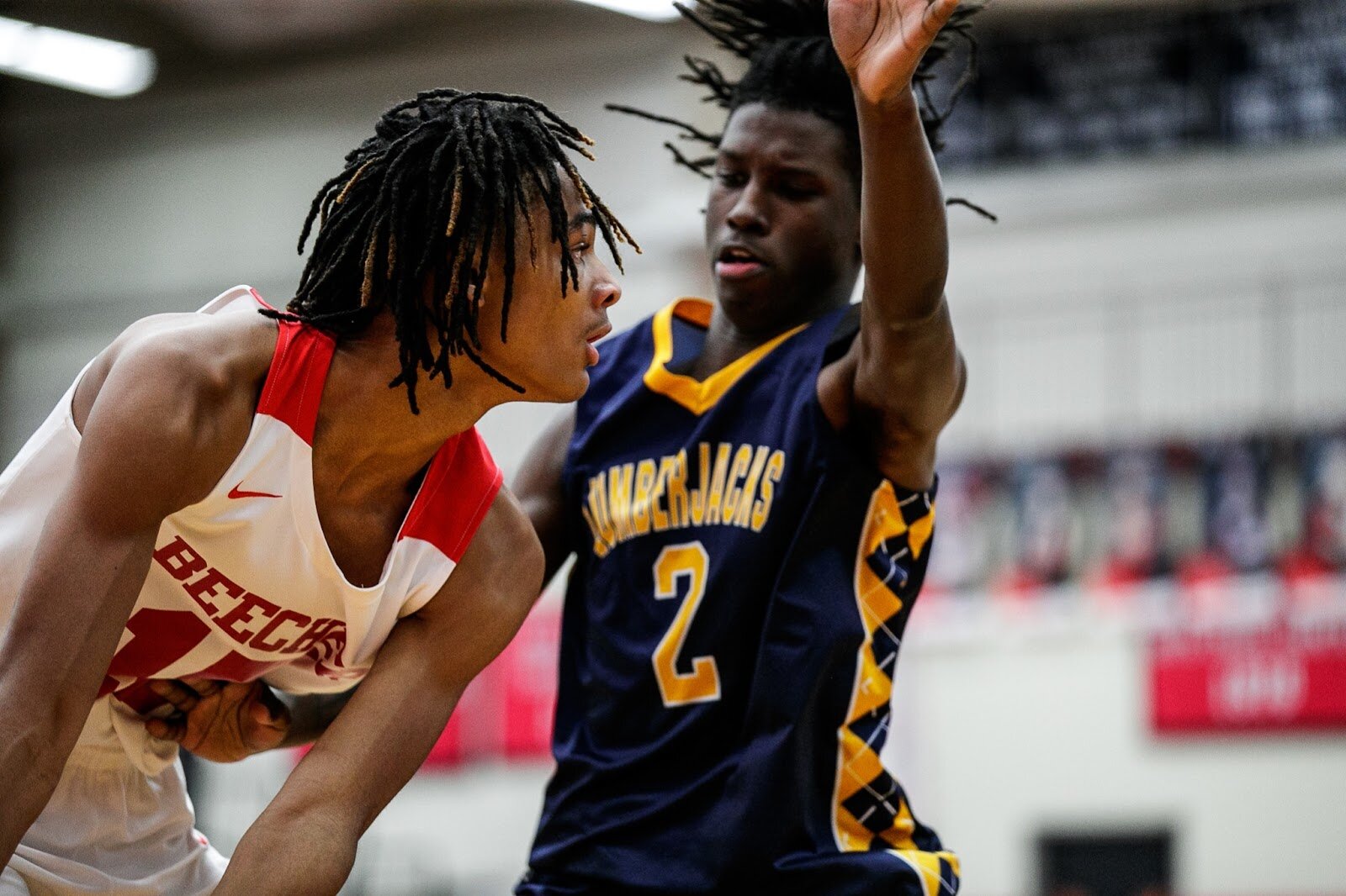 Beecher sophomore Wasir James looks for a pass during the Beecher vs Saginaw Arthur Hill game at Grand Blanc High School for The Carmody Classic on Saturday, Jan. 07, 2022. Beecher defeated Arthur Hill 77-44 (Jenifer Veloso | Flintside)
