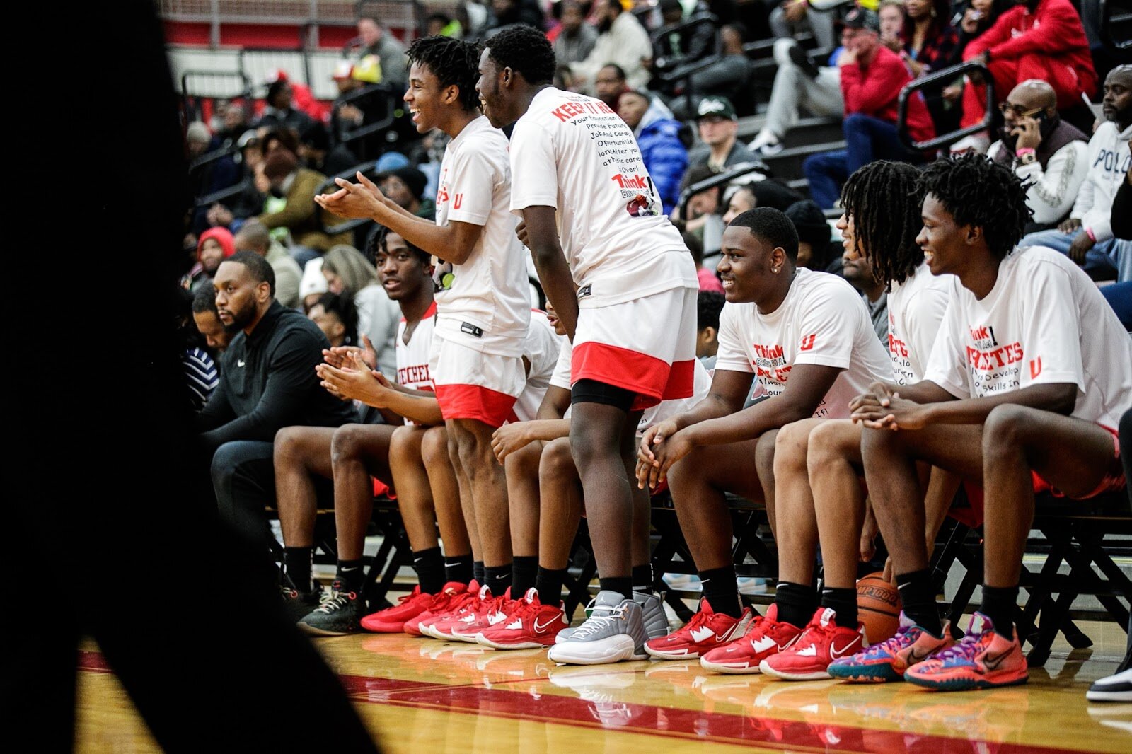 Beecher teammates cheer from the bench during the Beecher vs Saginaw Arthur Hill game at Grand Blanc High School for The Carmody Classic on Saturday, Jan. 07, 2022. Beecher defeated Arthur Hill 77-44 (Jenifer Veloso | Flintside)
