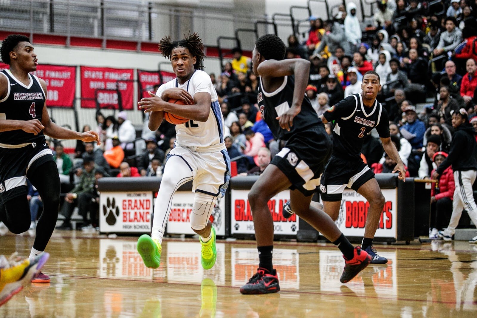 Hamady Sean Byrd drives the ball during the Hamady vs Hamtramck game at Grand Blanc High School for The Carmody Classic on Saturday, Jan. 07, 2022. Hamady defeated Hamtramck 70-55 (Jenifer Veloso | Flintside)
