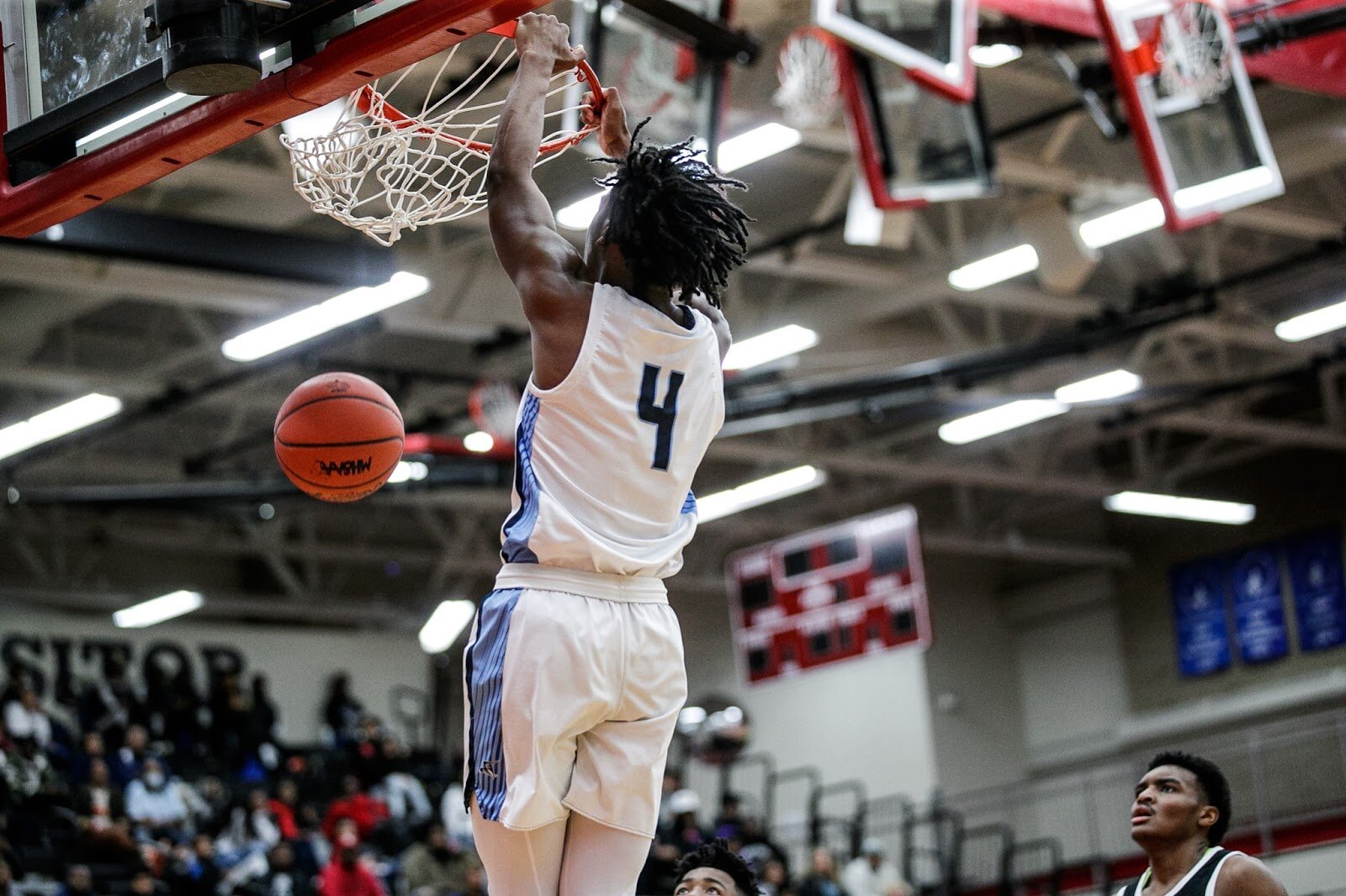 Hamady Jakobie Boose dunks during the Hamady vs Hamtramck game at Grand Blanc High School for The Carmody Classic on Saturday, Jan. 07, 2022. Hamady defeated Hamtramck 70-55 (Jenifer Veloso | Flintside)
