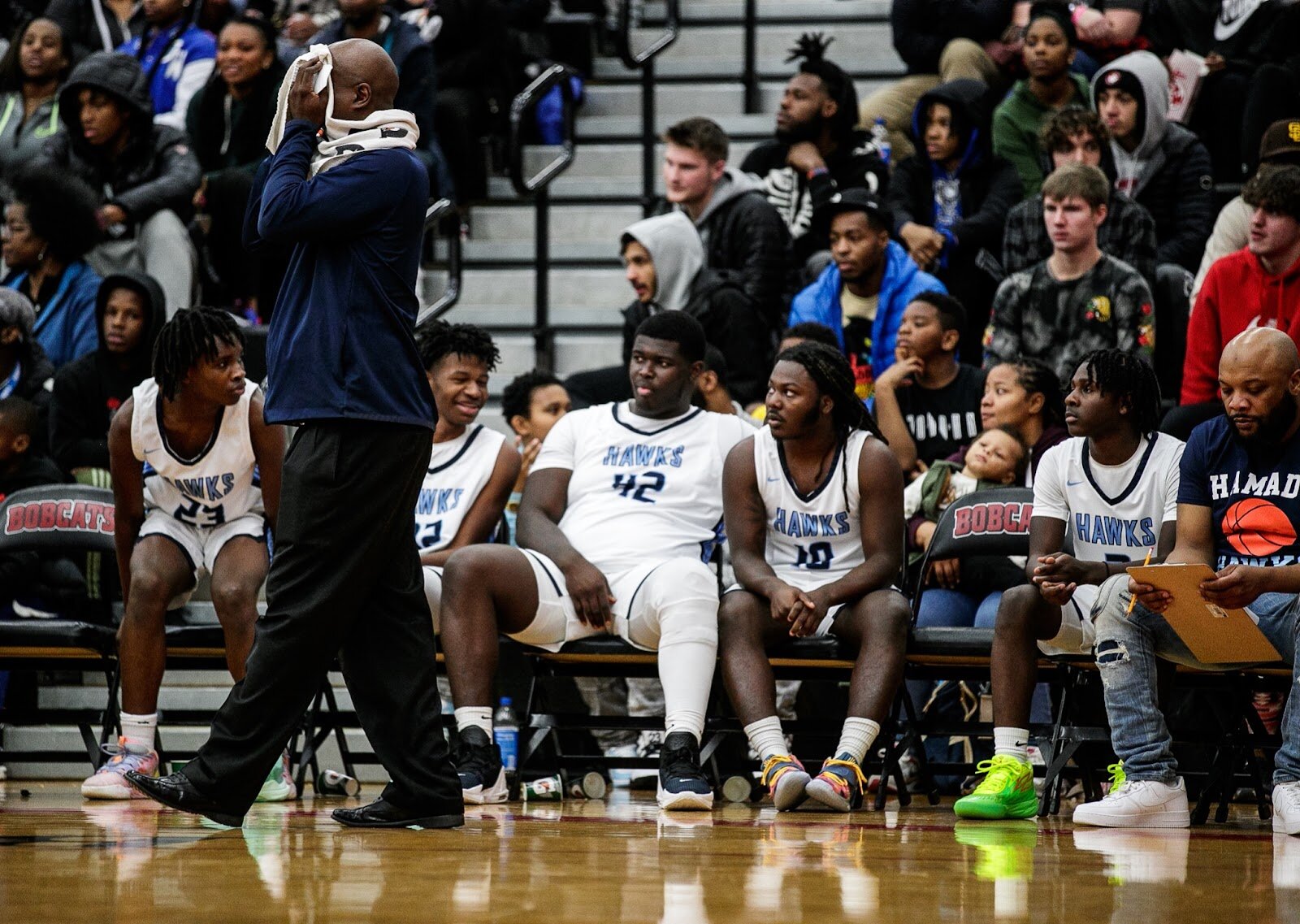 Hamady Head coach Lamont Torbert wipes his face while pacing on the sidelines during the Hamady vs Hamtramck game at Grand Blanc High School for The Carmody Classic on Saturday, Jan. 07, 2022. Hamady defeated Hamtramck 70-55 (Jenifer Veloso | Flintside)
