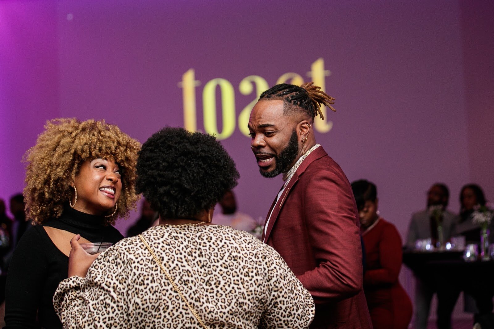 Chef Brandon Dewayne laughs and spends time with guests during the third annual Toast Awards, hosted by Beats x Beers, at the Flint Institute of Arts on Saturday, Dec. 17, 2022. (Jenifer Veloso | Flintside)
