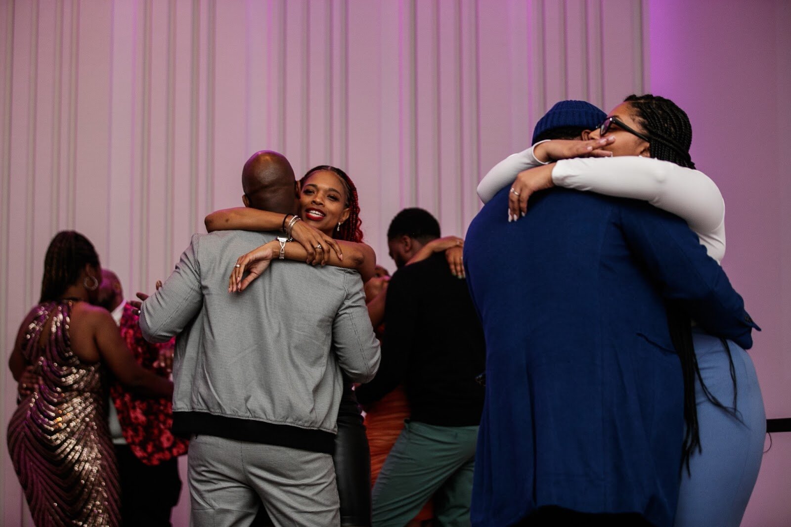 Guests dance together to DJ Handelz mixed music during the third annual Toast Awards, hosted by Beats x Beers, at the Flint Institute of Arts on Saturday, Dec. 17, 2022. (Jenifer Veloso | Flintside)
