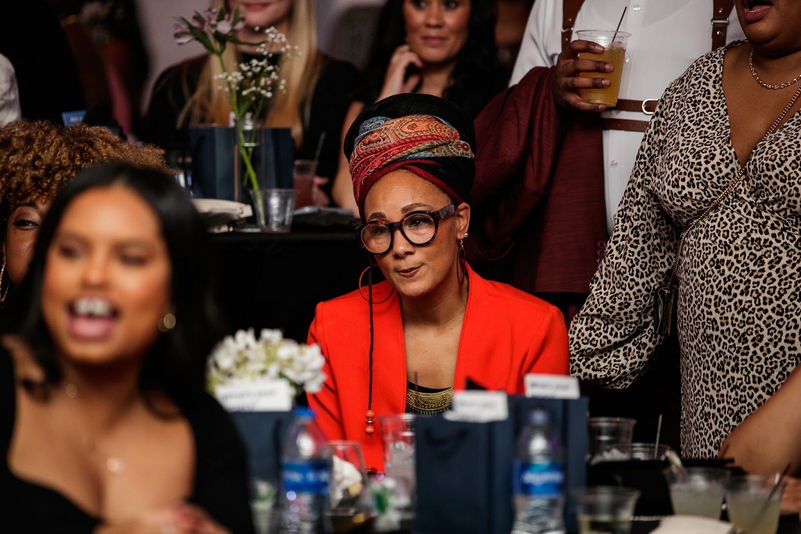 Mama Sol listens as she is announced as the Trail Blazer award recipient during the third annual Toast Awards, hosted by Beats x Beers, at the Flint Institute of Arts on Saturday, Dec. 17, 2022. (Jenifer Veloso | Flintside)
