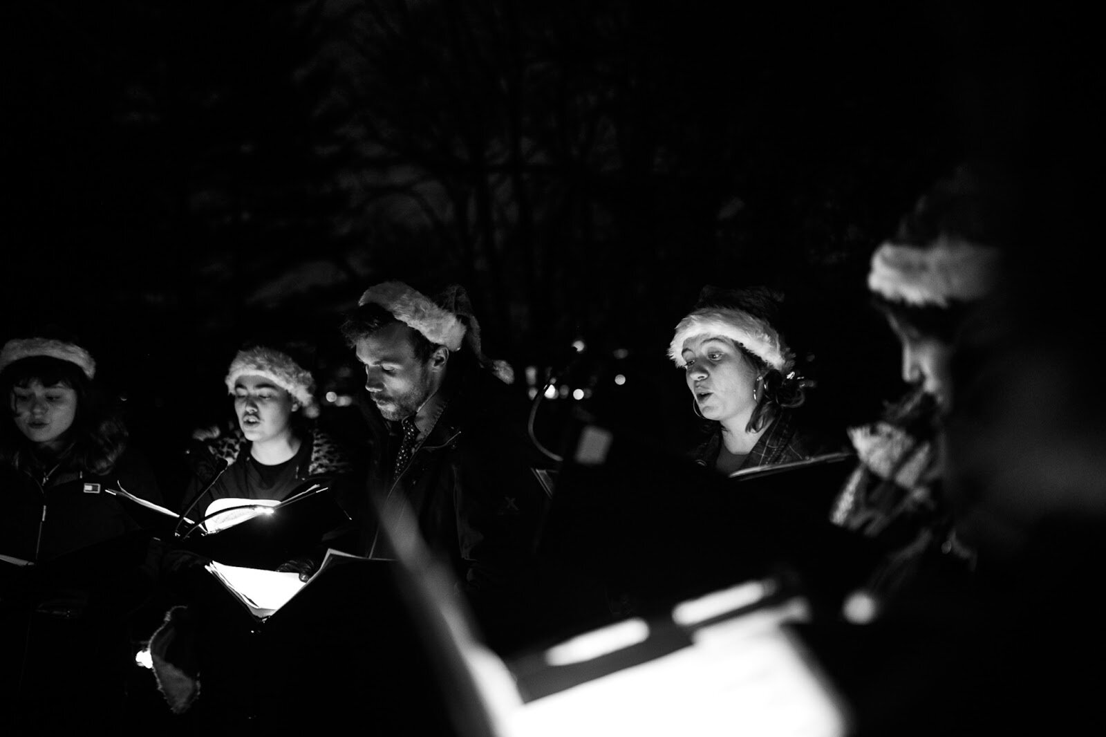 Carolers at Applewood sing Christmas classics during the College Cultural area’s 37th Annual Holiday Walk in Flint on Tuesday, Dec. 6, 2022. (Jenifer Veloso | Flintside)
