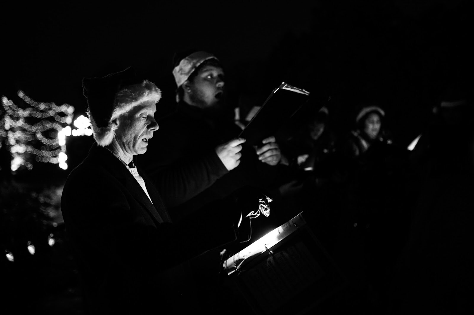 Carolers at Applewood sing Christmas classics during the College Cultural area’s 37th Annual Holiday Walk in Flint on Tuesday, Dec. 6, 2022. (Jenifer Veloso | Flintside)
