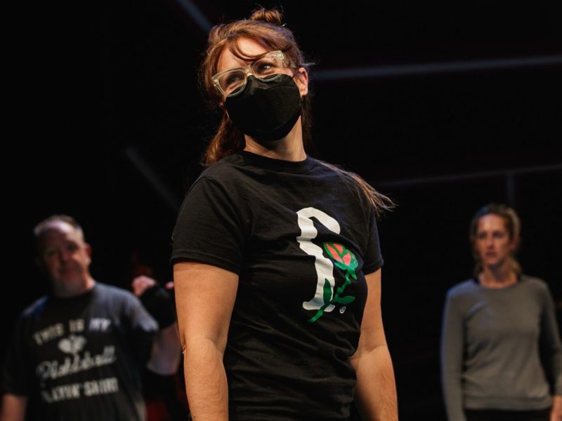 Rhiannon Ragland smiles as she looks at the soundboard while on the set of The Purple Rose's latest play 'PickleBall' on Friday, Sept. 20, 2022. (Jenifer Veloso | Flintside)