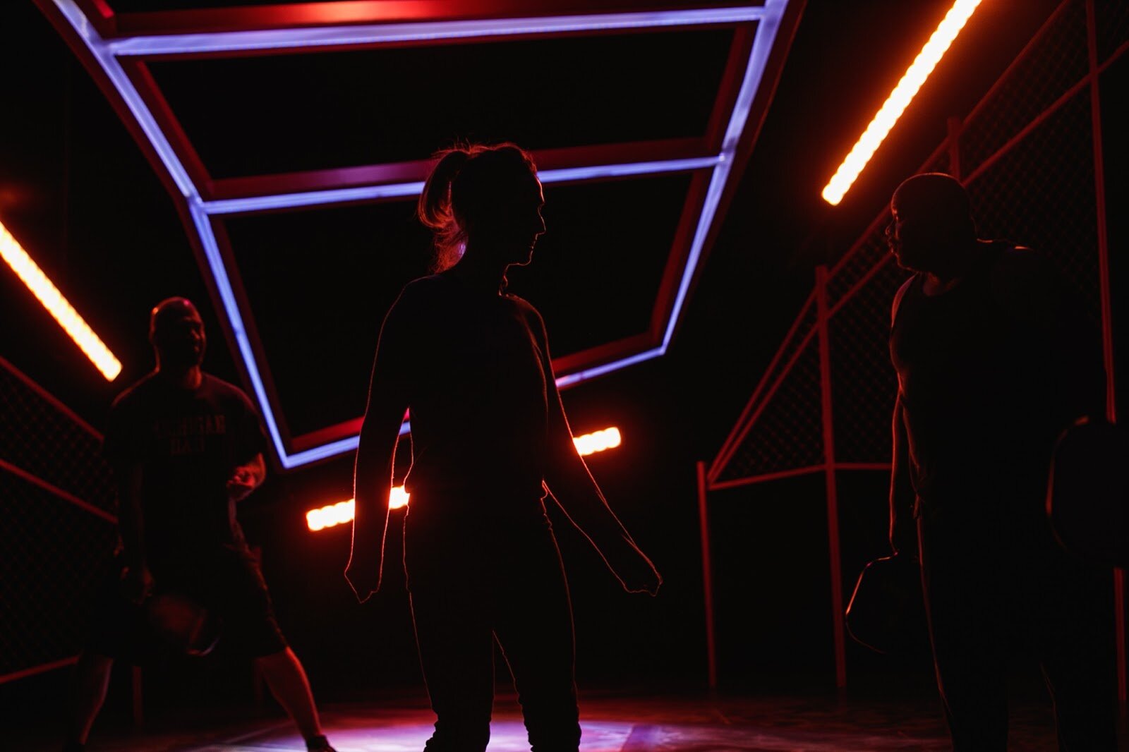 Actors take their places on the set of Pickleball during a rehearsal at the Purple Rose Theatre in downtown Chelsea on Friday, Sept. 30, 2022. (Jenifer Veloso | Flintside)
