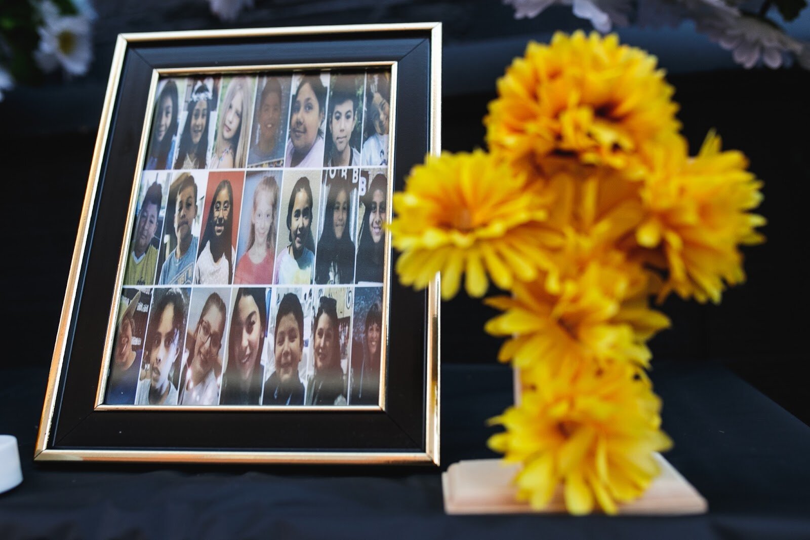 An ofrenda for the children who were killed in the Uvalde Shooting sits on display during the Latinx Technology and Community Center's Dia de Los Muertos celebration on Wednesday, Nov. 2, 2022 in downtown Flint. (Jenifer Veloso | Flintside)
