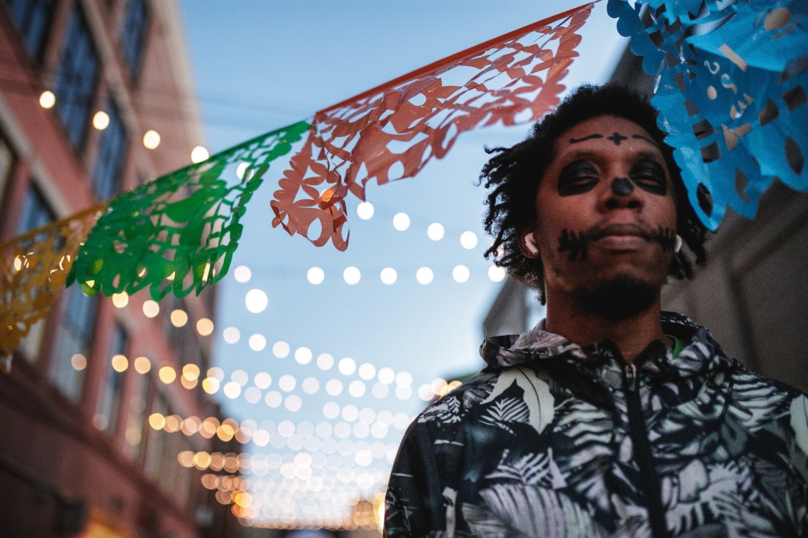 Jeremy Drummon poses for a portrait during the Latinx Technology and Community Center's Dia de Los Muertos celebration on Wednesday, Nov. 2, 2022 in downtown Flint. (Jenifer Veloso | Flintside)