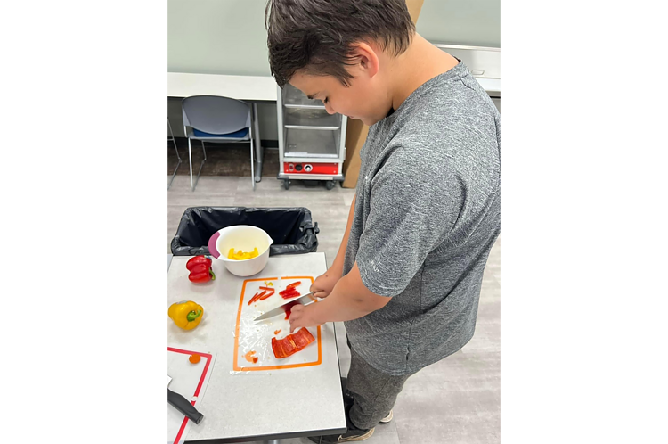 Teens participate in BMCC's Teen Battle Chef program.