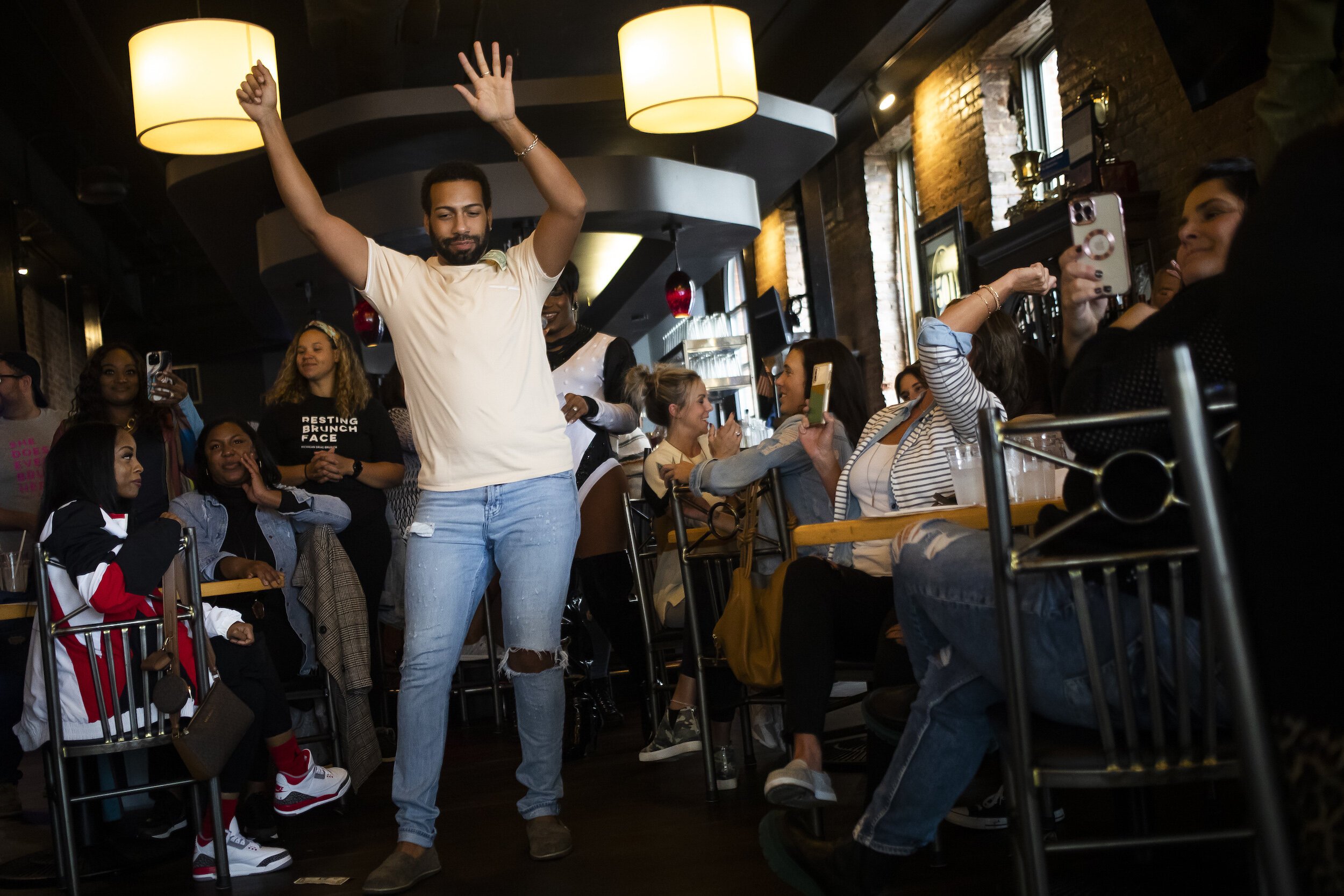 Nicholas Hoist of Bay City competes in a game called "Shake Your Shit" during a Michigan Drag Brunch performance Sunday, Sept. 25, 2022 at 501 Bar and Grill in downtown Flint.