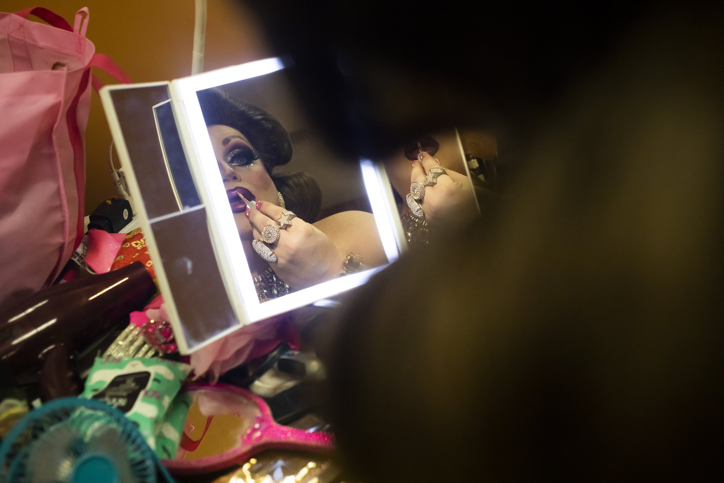 Veronica Scott touches up her look before her second performance during a Michigan Drag Brunch event Sunday, Sept. 25, 2022 at 501 Bar and Grill in downtown Flint.