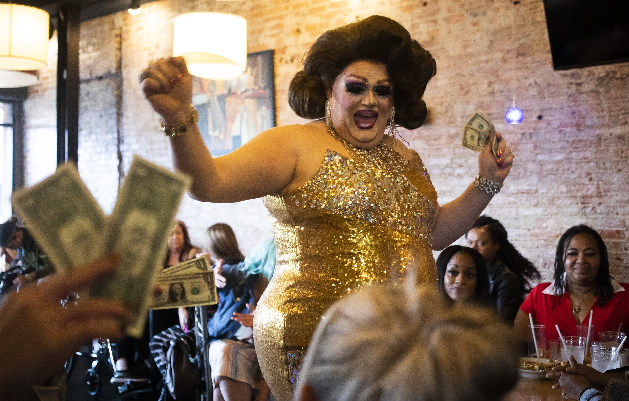 Veronica Scott entertains the crowd during a Michigan Drag Brunch performance Sunday, Sept. 25, 2022 at 501 Bar and Grill in downtown Flint.
