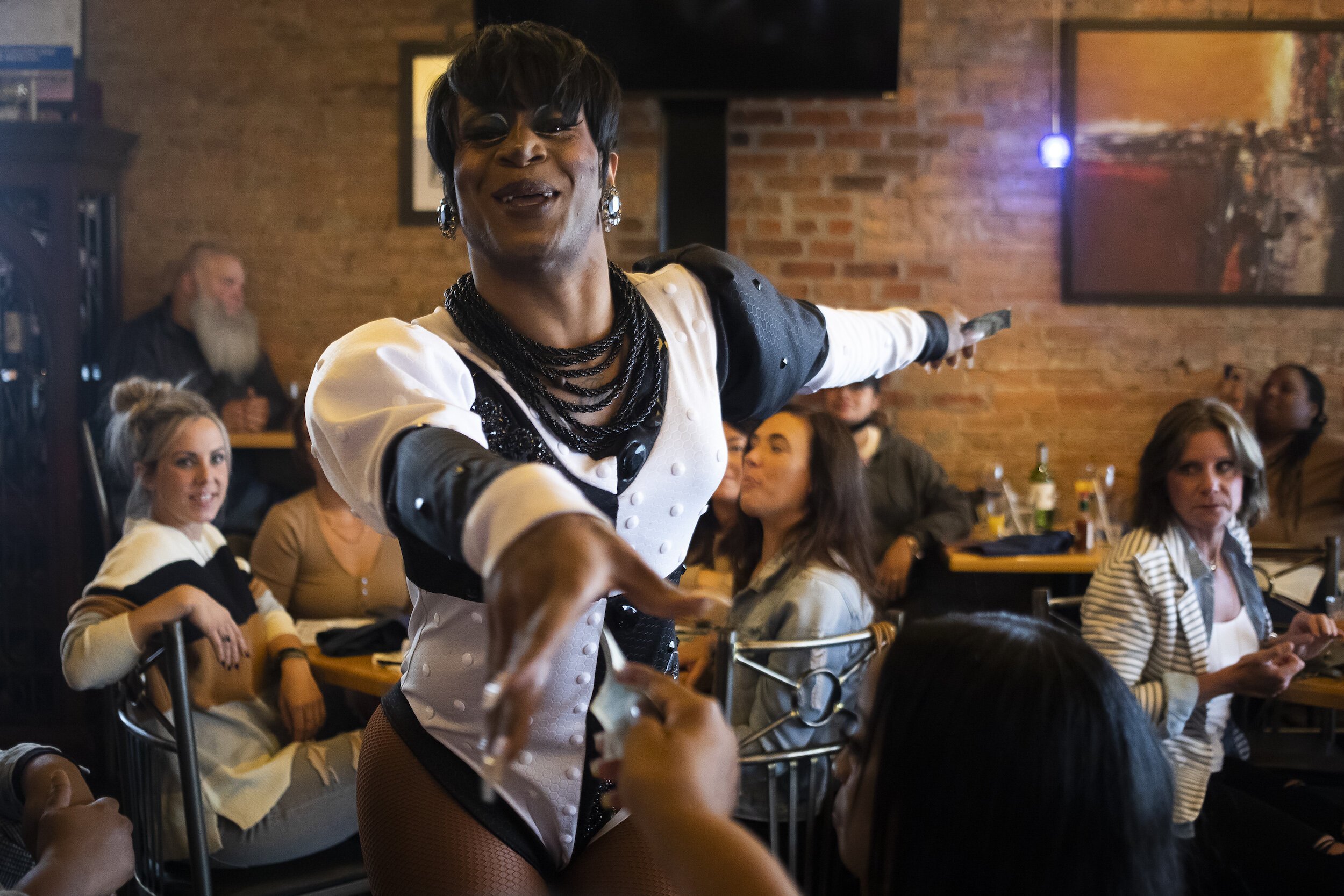 Kardi Redd Diamond entertains the crowd during a Michigan Drag Brunch performance Sunday, Sept. 25, 2022 at 501 Bar and Grill in downtown Flint.