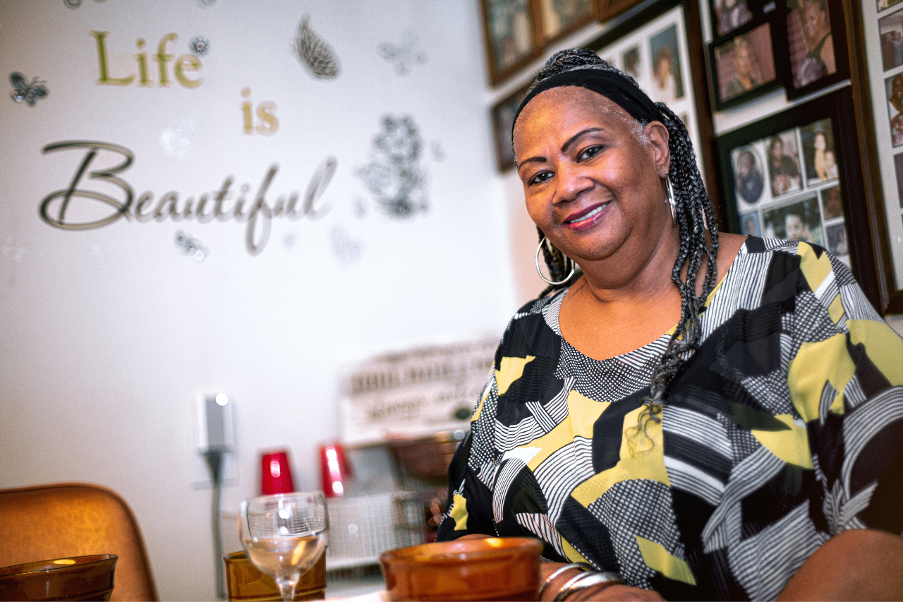 “Life is beautiful” is displayed on the kitchen wall along with family portraits of children, grandchildren, and great-grandchildren on Wednesday, June 1, 2022. (Bryce Mata | Flintside.com) 
