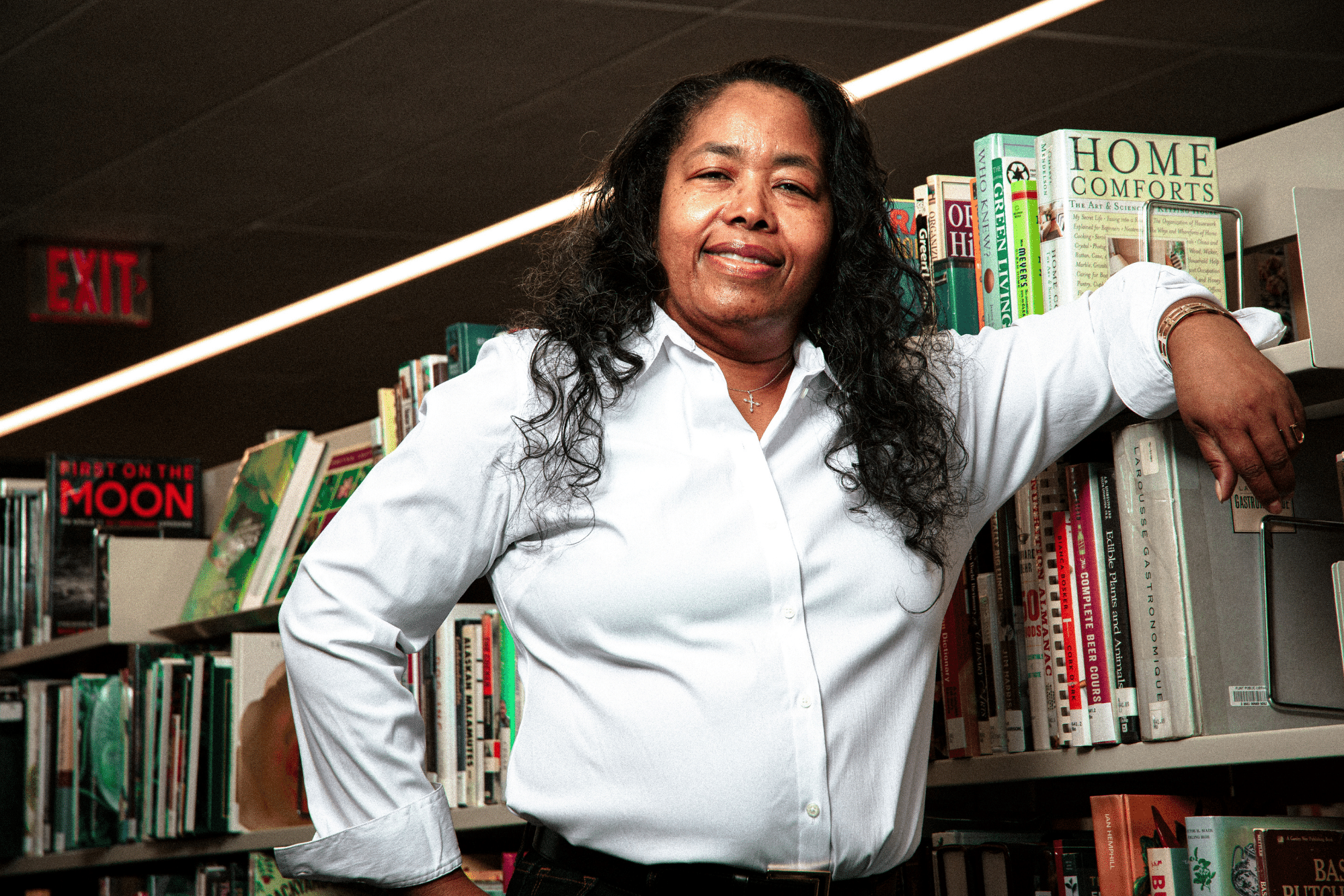 Sarvis Park resident Dee Straham poses inside the Flint Public Library on Wednesday, Aug. 31, 2022. (Bryce Mata | Flintside.com)