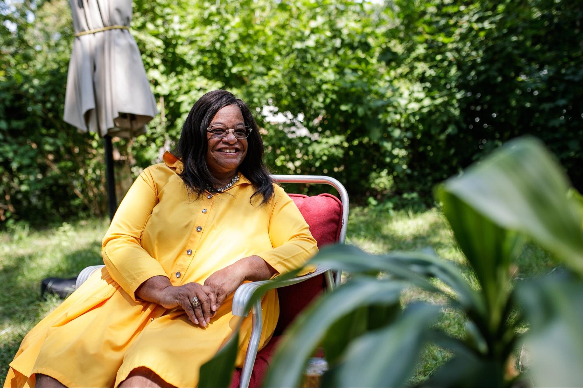 Flint native Victoria McKenze sits with Flintside's Jarielle Nettles for an interview at her home on Friday, Aug. 19, 2022, in Flint. (Jen Veloso | Flintside.com)