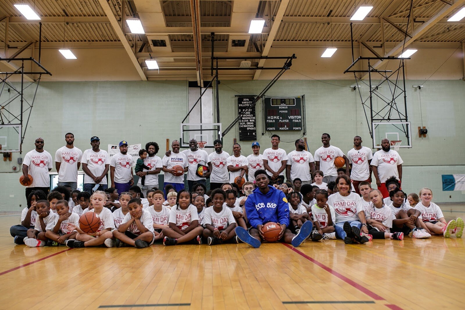 Hamidou Diallo poses for a portrait alongside attendants during Hami Day Camp at Flint Northwestern High School on Friday, Aug. 27, 2022. (Jenifer Veloso | Flintside.com)

