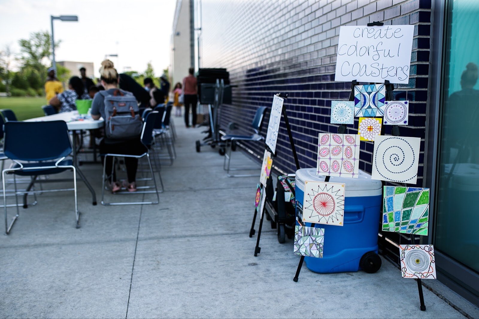 The FIA provides free outdoor art crafts for friends and families during Family Night at 'Late Night at the FIA' on Friday, Aug. 19, 2022. (Jenifer Veloso | Flintside.com)
