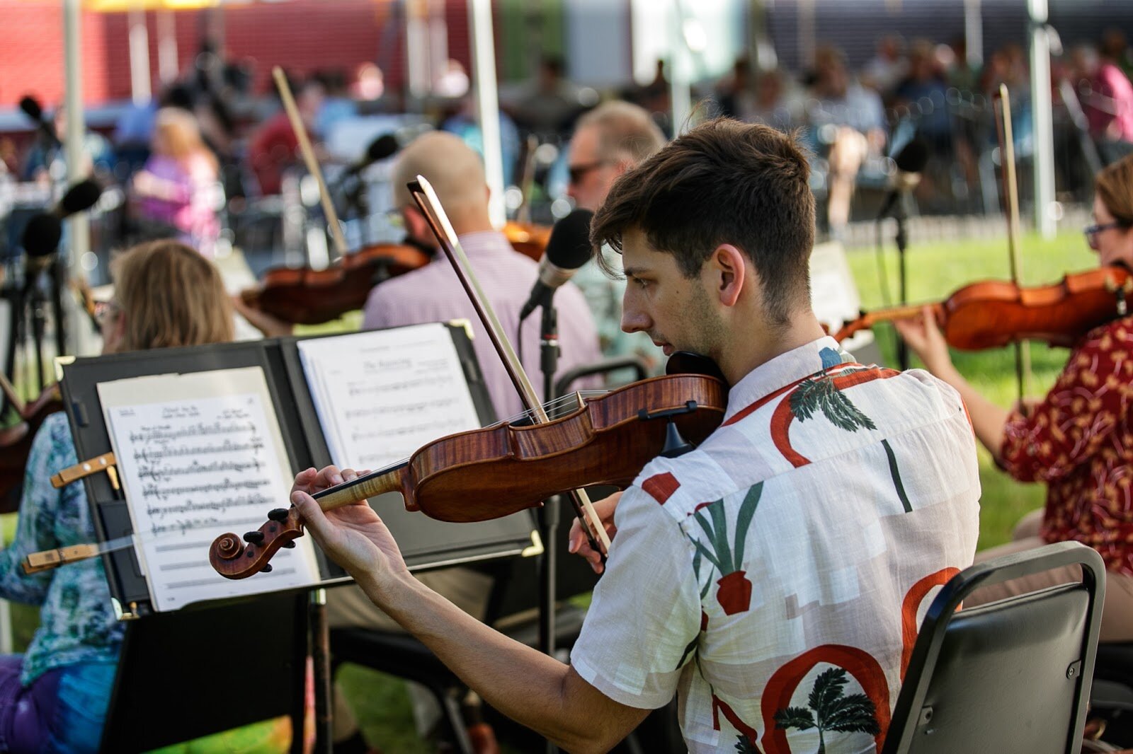 The Flint Symphony Orchestra ensemble plays live music during Family Night at 'Late Night at the FIA' on Friday, Aug. 19, 2022. (Jenifer Veloso | Flintside.com)
