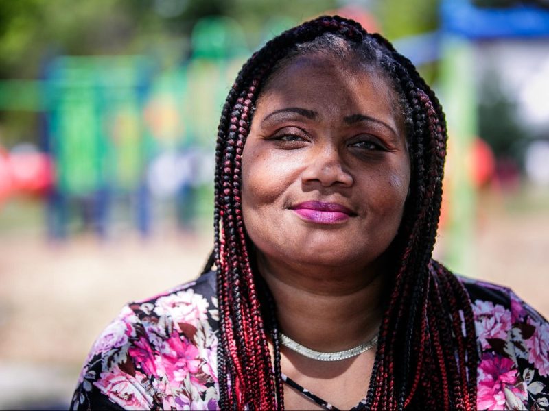Honny Williams poses for a portrait while sitting in Sarvis Park in Flint on July 26, 2022. (Jenifer Veloso | Flintside.com)
