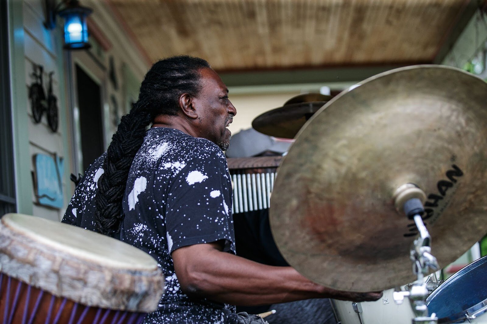 Live Music flows from the porches of Carriage Town during Porch Fest on Friday, July 15, 2022. (Jenifer Veloso | Flintside)