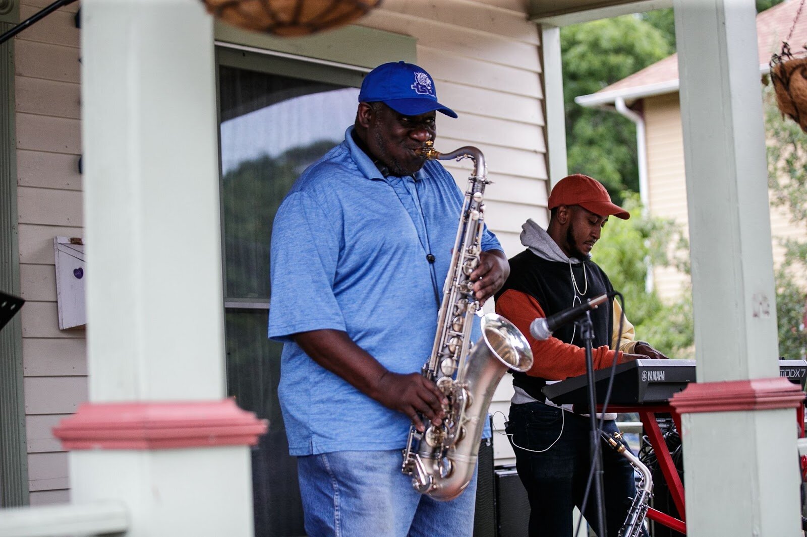 Live Music flows from the porches of Carriage Town during Porch Fest on Friday, July 15, 2022. (Jenifer Veloso | Flintside)