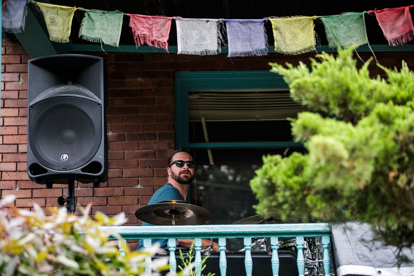 Live Music flows from the porches of Carriage Town during Porch Fest on Friday, July 15, 2022. (Jenifer Veloso | Flintside)
